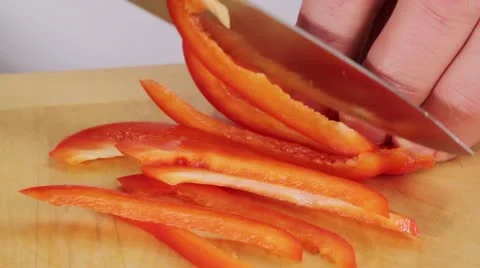 Finely chopping a red pepper Stock Footage 24655200