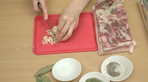 Finely cuting the remaining garlic Stock Footage 7740858