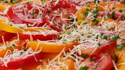 Finely grated parmesan cheese is being sprinkled. Видео 342281165
