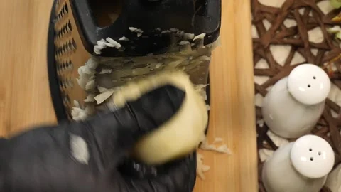 Finely Grating Potato for Smooth Mix Stock Footage 311391067