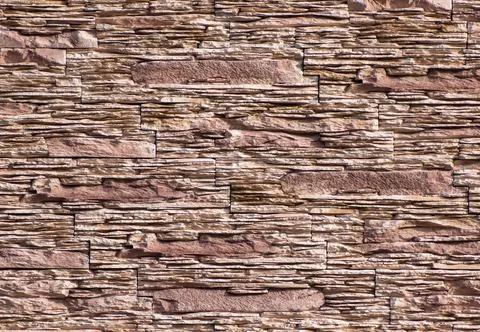 Finely structured surface with flat stones in sand color Fotos Stock