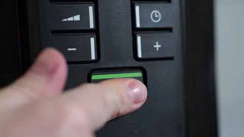 Finger activating eco mode in slow motion Stock Footage 307156177
