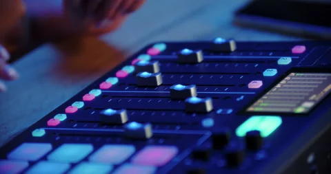 Finger adjusting slider on audio control panel Stock Footage 315517846