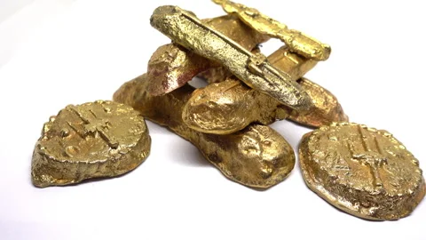 Finger bars and disc ingots of shipwrecked gold. Stock Footage 331229978