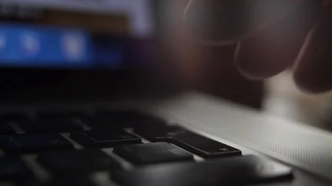 A finger on the black keyboard clicks Stock Footage 102785357