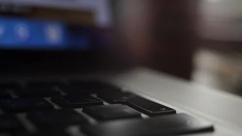 A finger on the black keyboard clicks Stock Footage 102785359