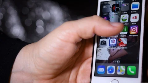 Finger click on the Instagram app icon on your smartphone Stock Footage 128195598