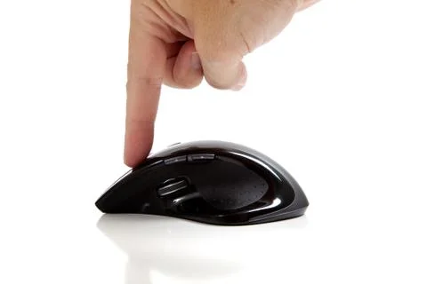 Finger clicking a computer mouse Stock Photos