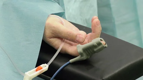 Finger digital device to measure oxygen saturation in blood and heart rate Stock Footage 162561035