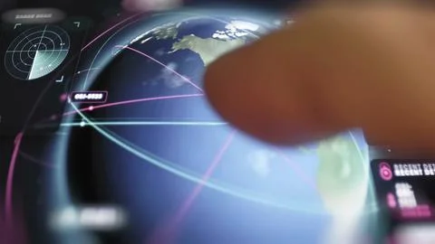 Finger explores interactive global orbit map Stock Photos