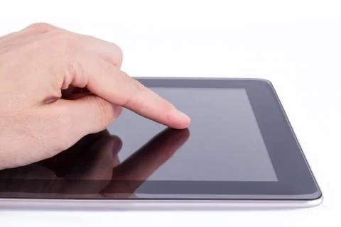 Finger gesturing on tablet Stock Photos
