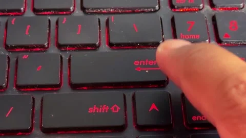 Finger hitting "enter" keyboard key, computer input action, Stock-Footage 333548902