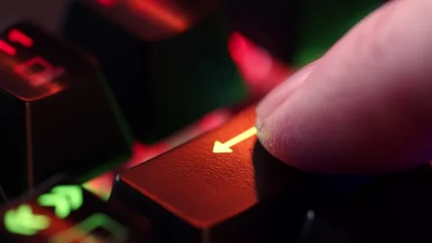 The finger hovers over the BackSpace key Stock Footage 302920582