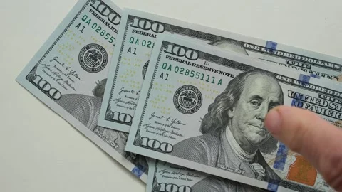 Finger on hundred-dollar bills. Counting dollars. Stock Footage 324577022