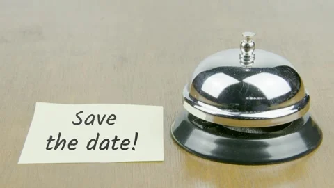 Finger Index Ringing Bell with Save The Date Text or Word on Yellow Note Stock Footage 300878634