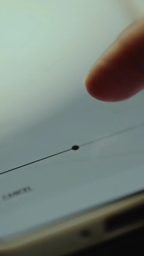 Finger interacting with a slider control to adjust the value Stock Footage 327450862