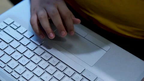 Finger Kid Touch On Touch-Pad Laptop, Play Game, Browsing Or Education Concept. Stock Footage 202470371