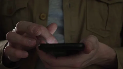 Finger of man scrolls page app on mobile phone. Stock Footage 171411817