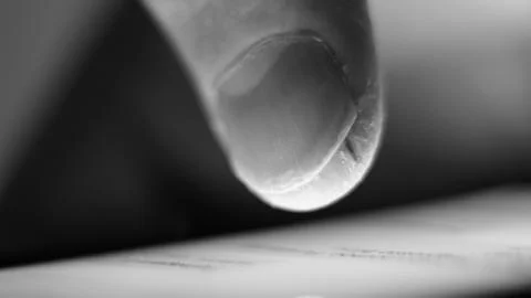 Finger on a mobile screen macro Stock Photos