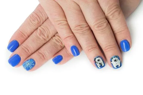 Finger nail with winter pattern Stock Photos