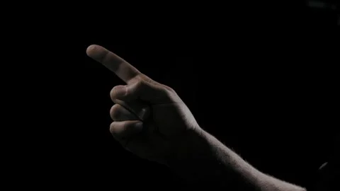 Finger Pointing in Darkness – Command or Attention Gesture Stock Footage 306312131