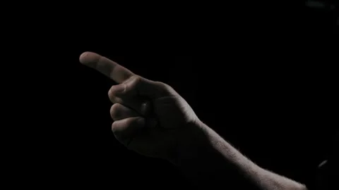 Finger Pointing in Darkness – Command or Attention Gesture Stock Footage 306312151