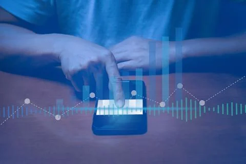 Finger pointing on mobile phone touch screen in blue tone. Stock Photos