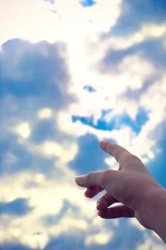 Finger pointing at the sky Stock Photos