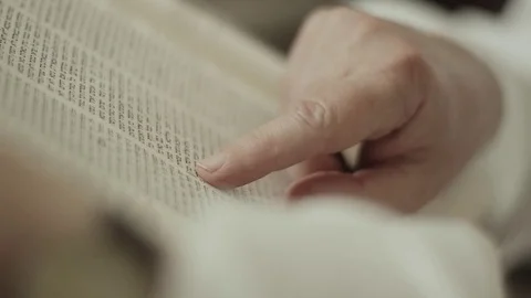 A Finger Pointing To Text In The Gemara Vídeos de archivo 83753558