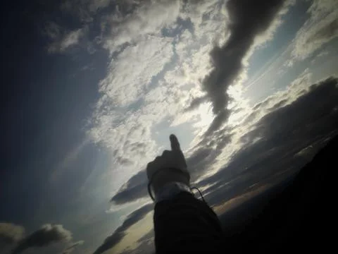 Finger Pointing Toward the Clouds 写真素材