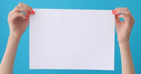 Finger points on blank sheet of paper in female hand 動画素材 107591830