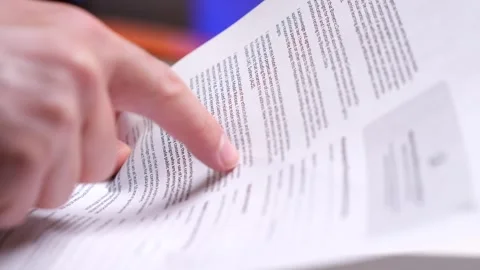 Finger points to an important point in the document Stock Footage 271006922
