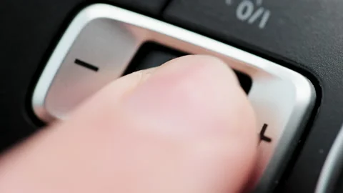 Finger press the button to start the autonomous cruise control autopilot Stock Footage 194714635
