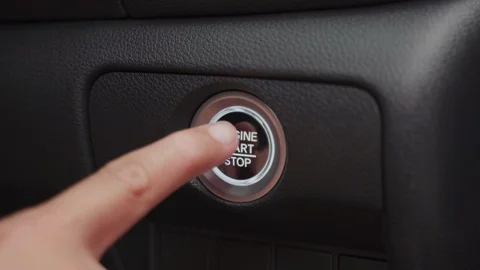 Finger press the button to start the car engine. Start and stop engine. Stock Footage 120020235