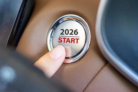 Finger press a car ignition button with 2026 START text inside  automobile... Stock Photos