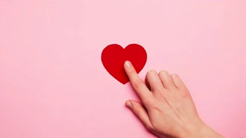 Finger press clicking on button of a red heart sign, like in social media Stock Footage 146095863