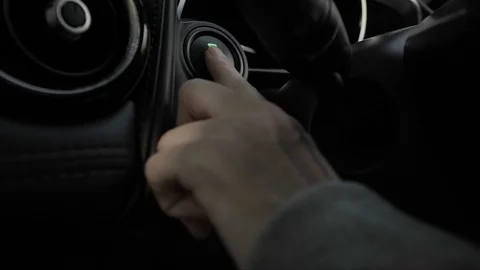 Finger press engine starting button car Stock Footage 87245708