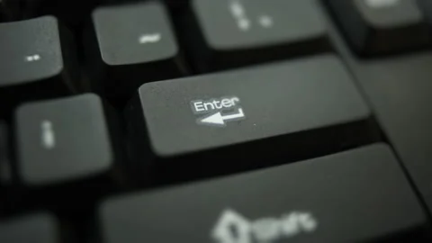 Finger press a key on the keyboard. Enter, confirm, run, send and input command Video stock 239273513