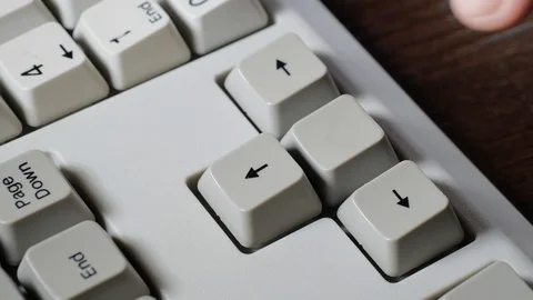Finger presses BACK button on keyboard 動画素材 121077621