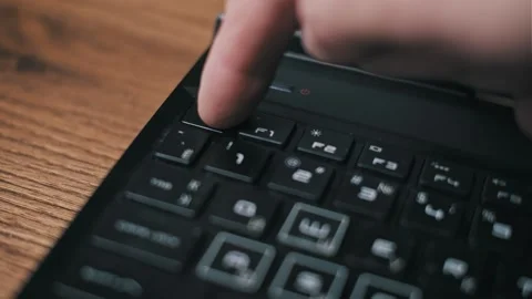 Finger Presses Black ESC Keyboard Key Repeatedly Stock Footage 320354316