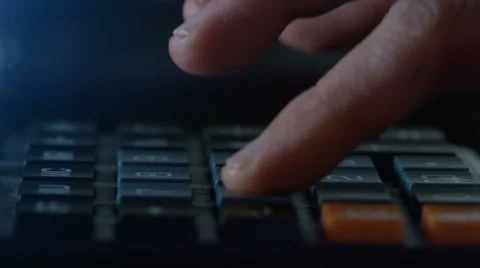 Finger presses the button calculator. closeup and  shallow depth of field Stock Footage 58696575