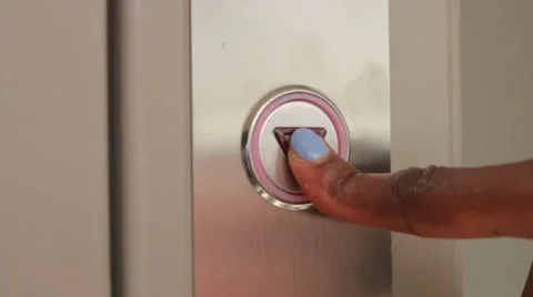 Finger presses the button for the elevator Stock Footage 52855828