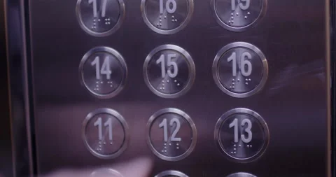 Finger presses the button of the elevator panel Stock Footage 173645803