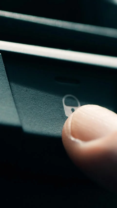 Finger presses door lock button in the car, vertical video Stock Footage 283011550