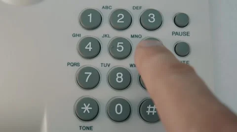 Finger presses each button on the white phone. Closeup Stock Footage 56262868