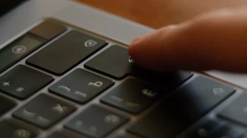Finger Presses The Enter Key Several Times With Fingerprint Left On Key Stock Footage 154167180