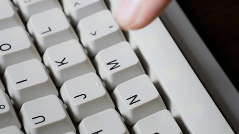 Finger presses J button on keyboard Video stock 121072416