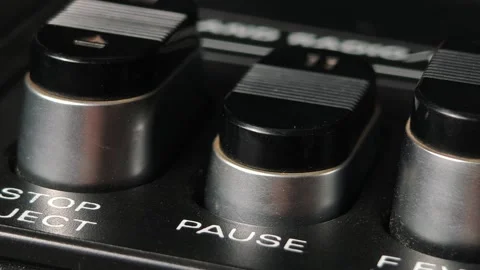 Finger Presses Pause Button on Old Player Stock Footage 318021598