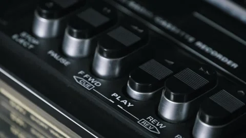 Finger Presses Play Button on Black Tape Recorder Stock Footage 318789719
