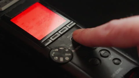 Finger Presses Record Button, Red Light Signals Surveillance or Filming Start Stock Footage 335186800